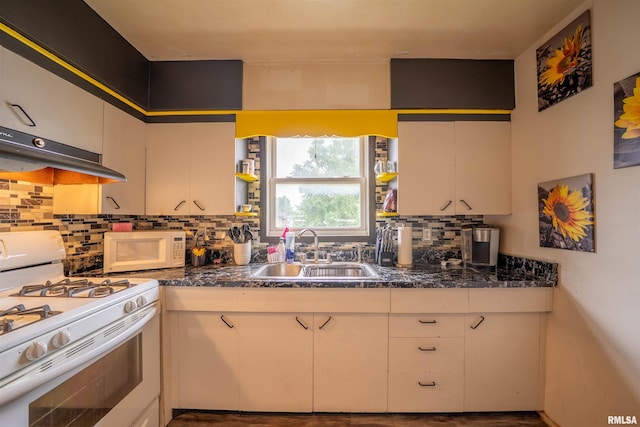 405 Washington St, Pekin, IL 61554 - kitchen featuring white appliances, a sink, ventilation hood, decorative backsplash, and white cabinets