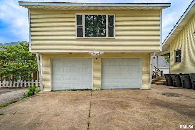 405 Washington St, Pekin, IL 61554 - garage with concrete driveway