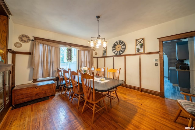 405 Washington St, Pekin, IL 61554 - dining space with wood finished floors and a chandelier