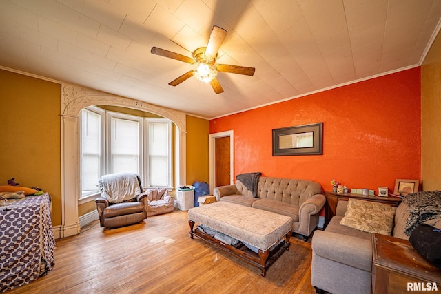 128 W Spruce St, Canton, IL 61520 - living area with crown molding, a ceiling fan, wood finished floors, a baseboard radiator, and a textured wall