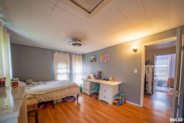 128 W Spruce St, Canton, IL 61520 - bedroom featuring light wood finished floors