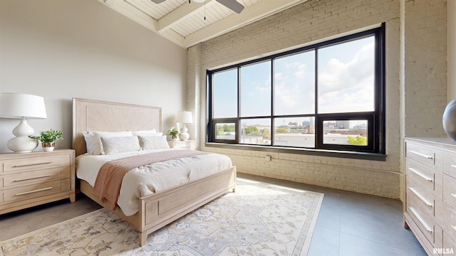 1001 SW Adams St Unit 304, Peoria, IL 61602 - bedroom with brick wall, high vaulted ceiling, and wooden ceiling with exposed beams