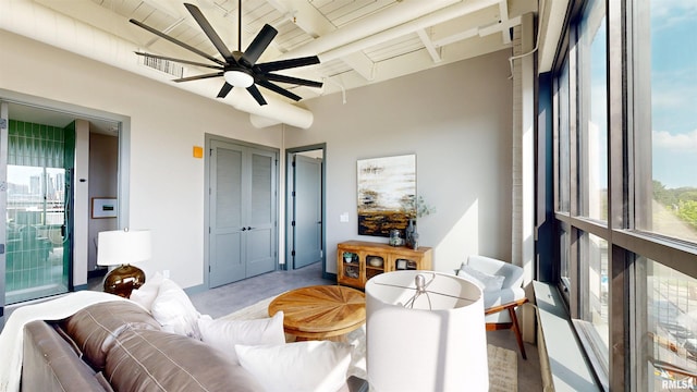 1001 SW Adams St Unit 304, Peoria, IL 61602 - sunroom featuring beamed ceiling