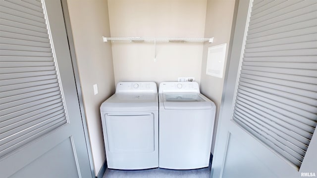 1001 SW Adams St Unit 304, Peoria, IL 61602 - laundry area with washing machine and dryer