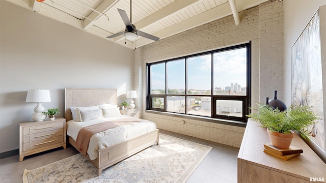 1001 SW Adams St Unit 304, Peoria, IL 61602 - bedroom featuring brick wall, a ceiling fan, wooden ceiling with exposed beams, and a city view