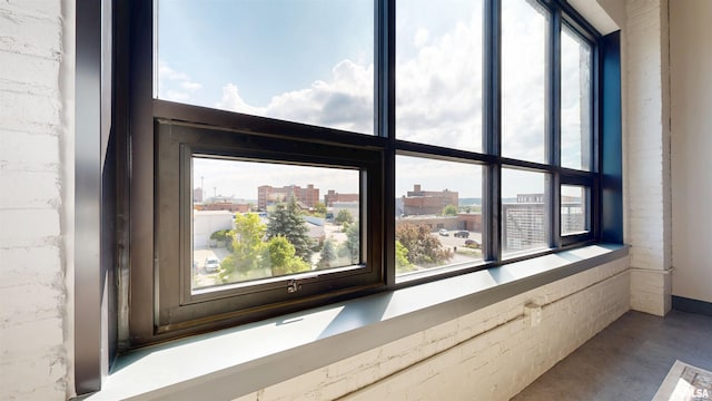1001 SW Adams St Unit 304, Peoria, IL 61602 - detailed view of concrete floors and a city view