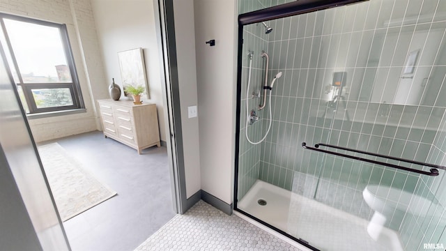 1001 SW Adams St Unit 304, Peoria, IL 61602 - bathroom with a stall shower