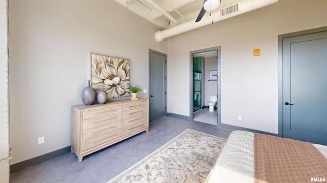 1001 SW Adams St Unit 304, Peoria, IL 61602 - bedroom featuring a towering ceiling, baseboards, and ensuite bathroom