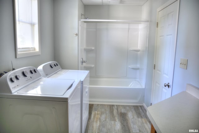 309 S Dudley St, Macomb, IL 61455 - laundry room with separate washer and dryer and wood finished floors