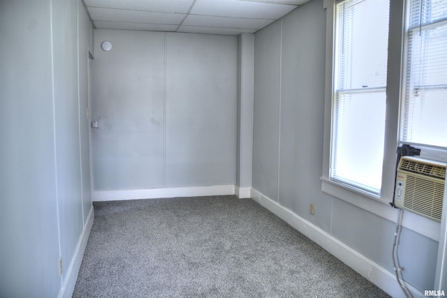 309 S Dudley St, Macomb, IL 61455 - carpeted empty room with a drop ceiling and cooling unit