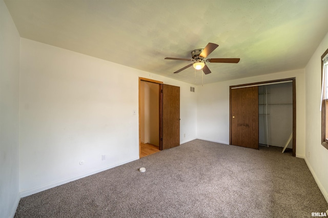2706 W Millbrook Ct, Peoria, IL 61615 - unfurnished bedroom with carpet, a closet, ceiling fan, and baseboards