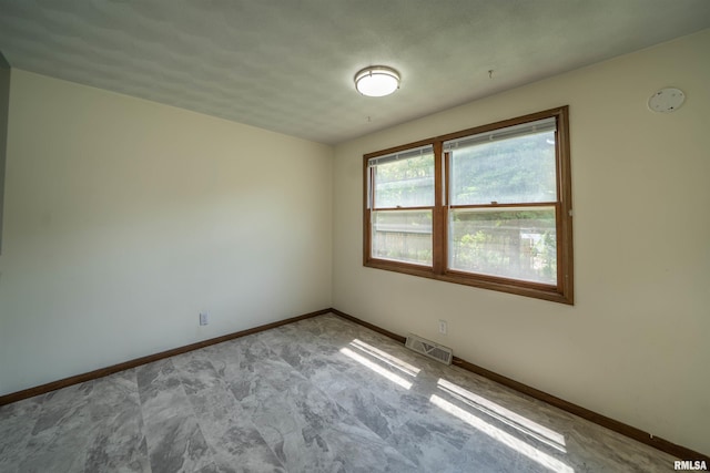 2706 W Millbrook Ct, Peoria, IL 61615 - spare room with baseboards