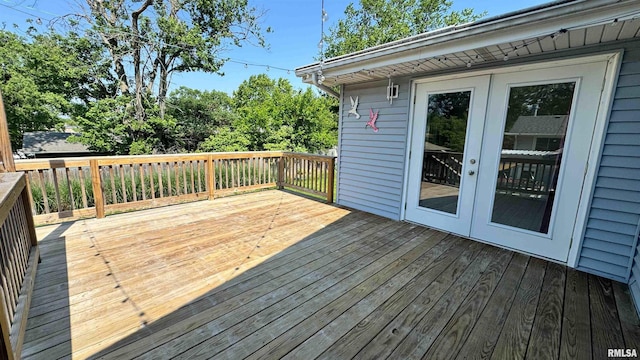7409 N Piccadilly Pl, Peoria, IL 61614 - wooden deck featuring french doors