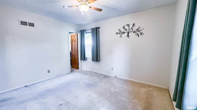 7409 N Piccadilly Pl, Peoria, IL 61614 - empty room featuring carpet floors and a ceiling fan