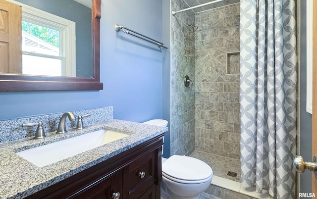 7409 N Piccadilly Pl, Peoria, IL 61614 - bathroom featuring tiled shower and vanity
