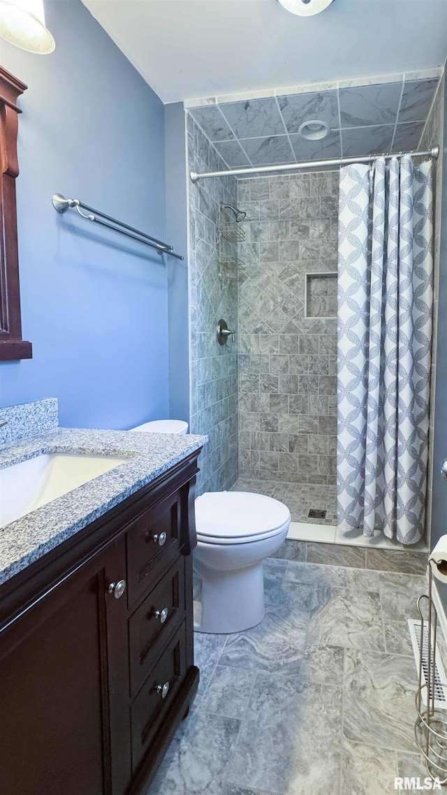 7409 N Piccadilly Pl, Peoria, IL 61614 - full bathroom featuring vanity and a tile shower