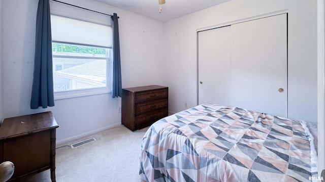 7409 N Piccadilly Pl, Peoria, IL 61614 - bedroom featuring light carpet and a closet