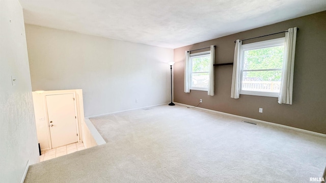 7409 N Piccadilly Pl, Peoria, IL 61614 - carpeted spare room with baseboards