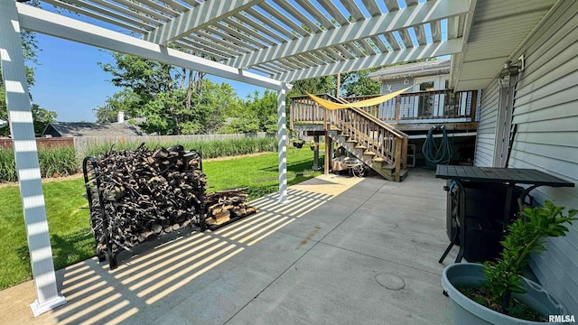 7409 N Piccadilly Pl, Peoria, IL 61614 - fenced backyard featuring a patio area, a pergola, stairway, and a deck