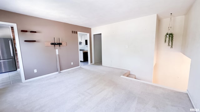 7409 N Piccadilly Pl, Peoria, IL 61614 - unfurnished room featuring carpet floors and baseboards