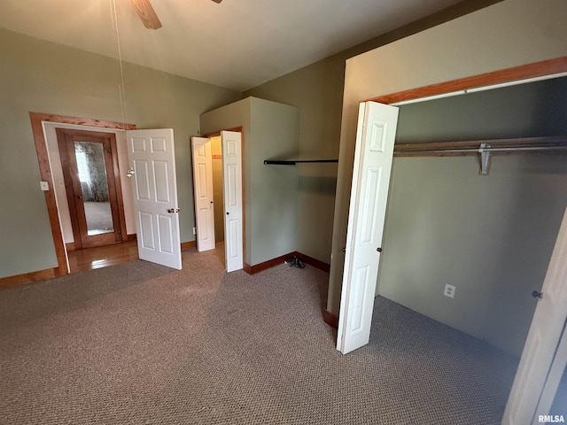 130 E Maple St, Roseville, IL 61473 - unfurnished bedroom with dark colored carpet, ceiling fan, a closet, and baseboards