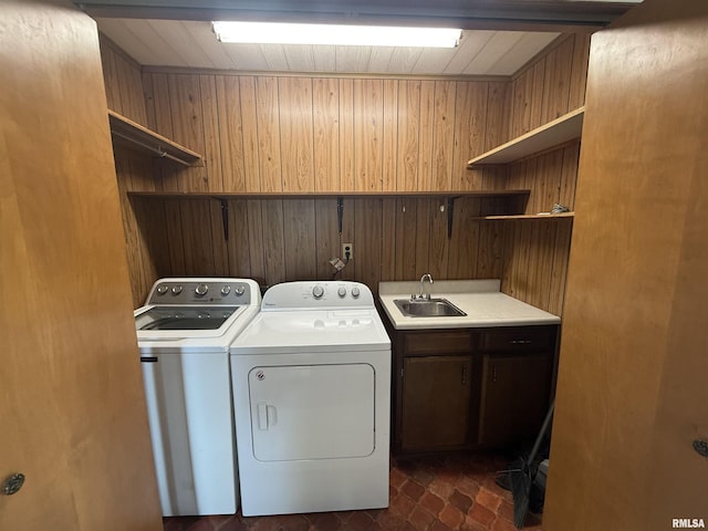 130 E Maple St, Roseville, IL 61473 - laundry area featuring cabinet space, washing machine and dryer, wood walls, and wooden ceiling