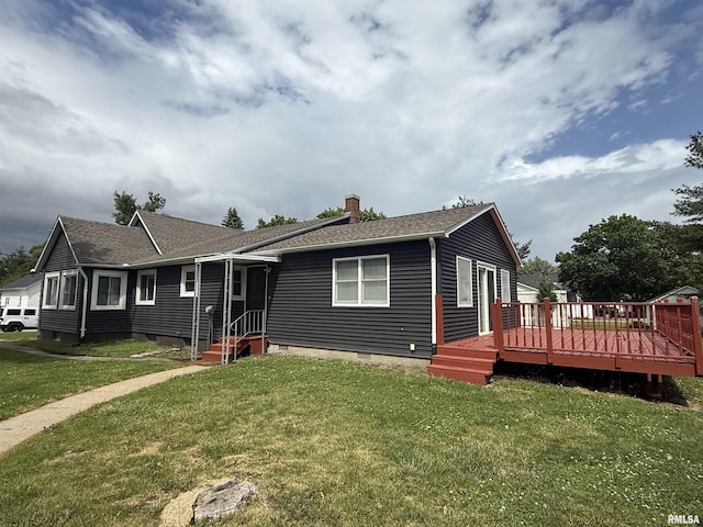 130 E Maple St, Roseville, IL 61473 - view of front of property with a chimney, a front lawn, a wooden deck, roof with shingles, and crawl space