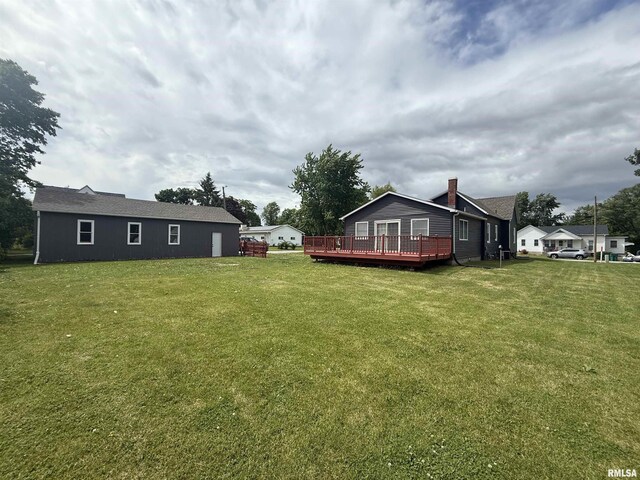 130 E Maple St, Roseville, IL 61473 - view of green lawn with a wooden deck