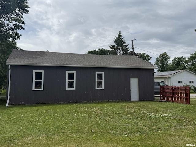130 E Maple St, Roseville, IL 61473 - view of side of home with a shingled roof