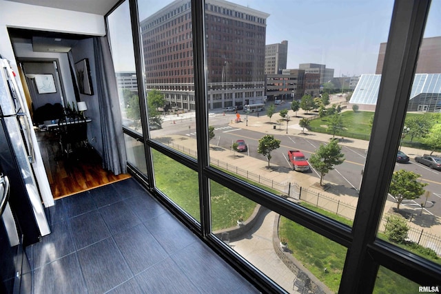 125 SW Jefferson Ave Unit W4S, Peoria, IL 61602 - sunroom featuring plenty of natural light and a view of city