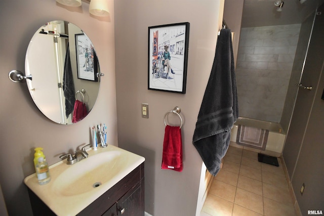 125 SW Jefferson Ave Unit W4S, Peoria, IL 61602 - full bath featuring vanity, tile patterned flooring, and baseboards