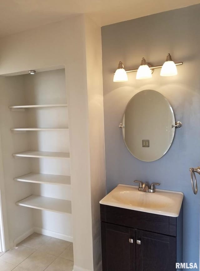 125 SW Jefferson Ave Unit W4S, Peoria, IL 61602 - bathroom featuring tile patterned flooring and vanity