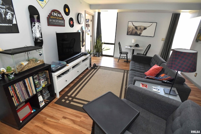125 SW Jefferson Ave Unit W4S, Peoria, IL 61602 - living room with wood finished floors