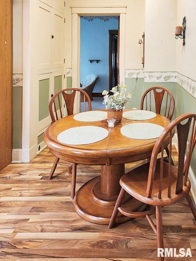 418 W Clinton St, Toulon, IL 61483 - dining room with wood finished floors and baseboards