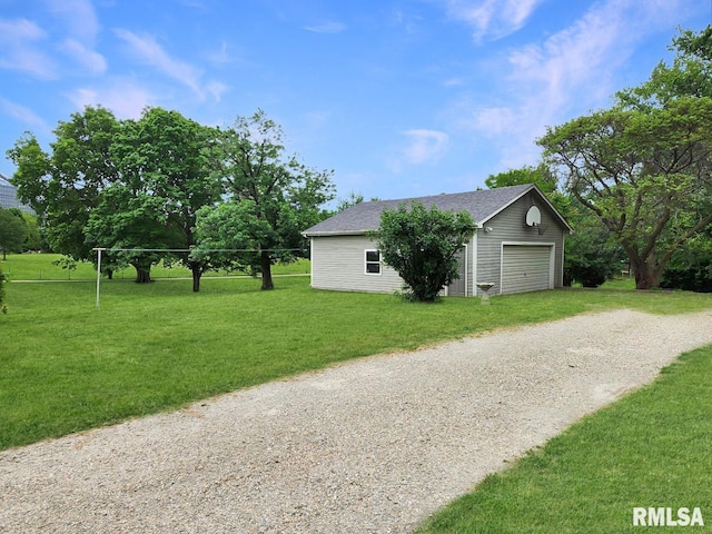 418 W Clinton St, Toulon, IL 61483 - garage with gravel driveway