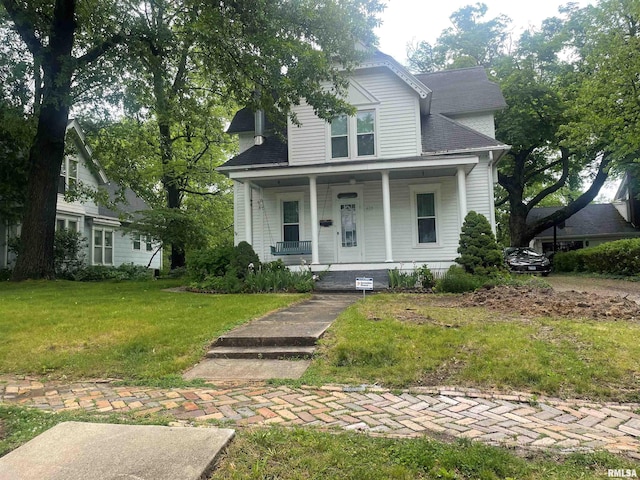 623 S Randolph St, Macomb, IL 61455 - view of front of home featuring covered porch and a front yard