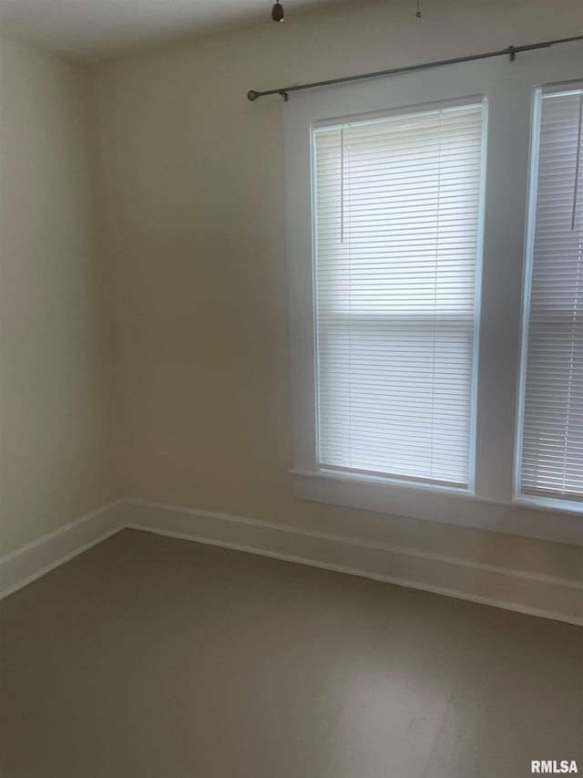 623 S Randolph St, Macomb, IL 61455 - empty room featuring baseboards