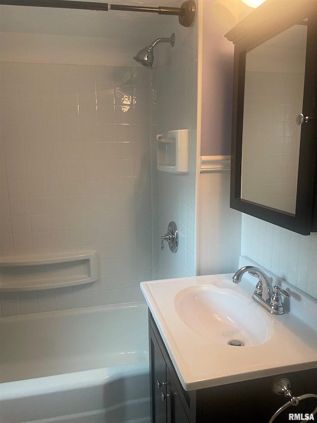 623 S Randolph St, Macomb, IL 61455 - full bath featuring shower / bathtub combination, vanity, and a wainscoted wall