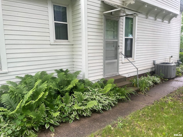623 S Randolph St, Macomb, IL 61455 - view of side of home featuring central AC and entry steps