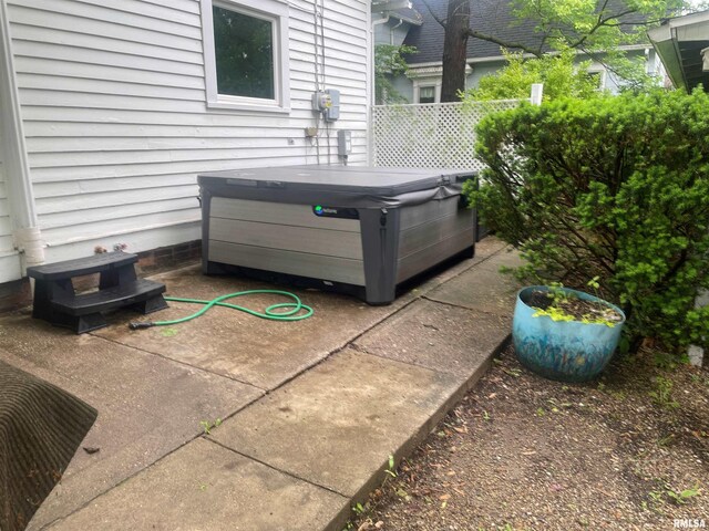 623 S Randolph St, Macomb, IL 61455 - view of patio / terrace with a hot tub