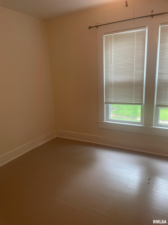623 S Randolph St, Macomb, IL 61455 - empty room featuring plenty of natural light and baseboards