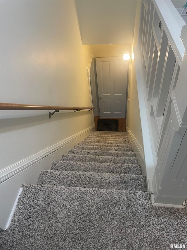 623 S Randolph St, Macomb, IL 61455 - stairs featuring carpet floors and baseboards