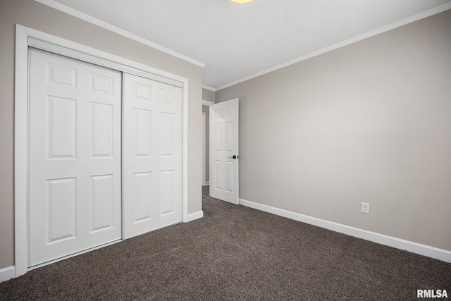 208 W Graze Ave, Dunlap, IL 61525 - unfurnished bedroom with baseboards, dark carpet, ornamental molding, and a closet
