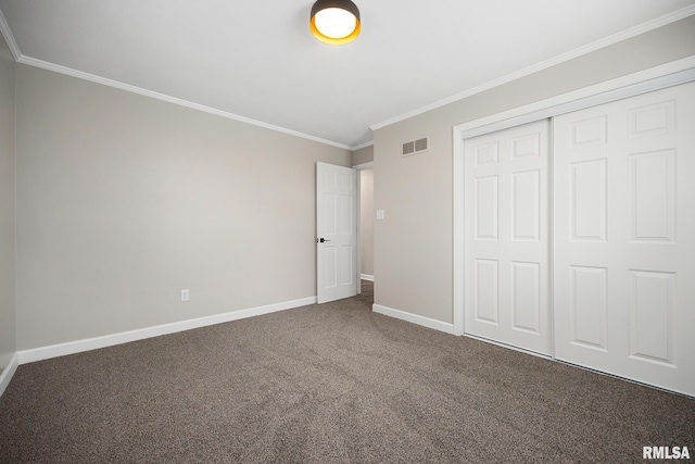 208 W Graze Ave, Dunlap, IL 61525 - unfurnished bedroom with ornamental molding, baseboards, carpet, and a closet