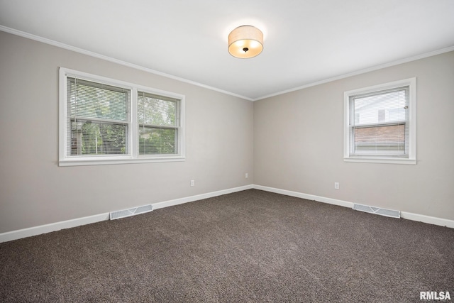 208 W Graze Ave, Dunlap, IL 61525 - unfurnished room featuring plenty of natural light, dark carpet, crown molding, and baseboards