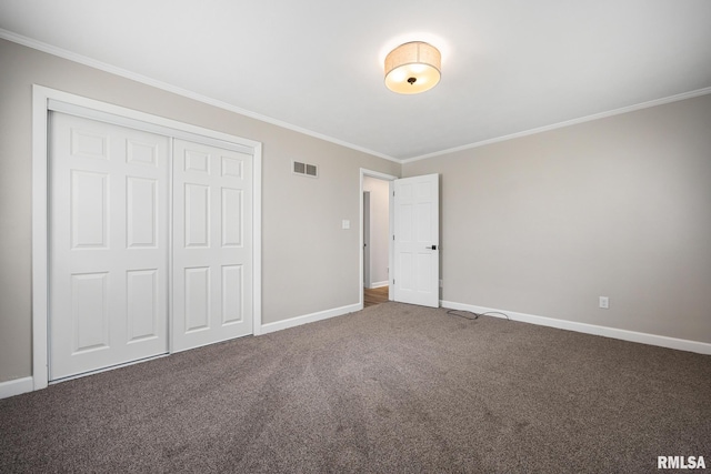 208 W Graze Ave, Dunlap, IL 61525 - unfurnished bedroom featuring ornamental molding, baseboards, carpet floors, and a closet