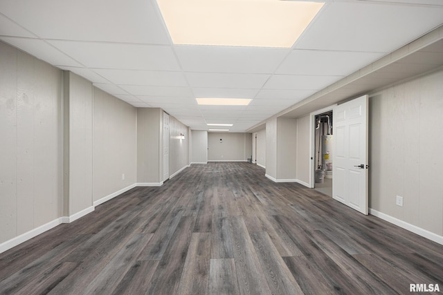 208 W Graze Ave, Dunlap, IL 61525 - finished below grade area with dark wood-type flooring, a drop ceiling, and baseboards