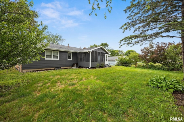 208 W Graze Ave, Dunlap, IL 61525 - back of house with a sunroom, cooling unit, and a lawn
