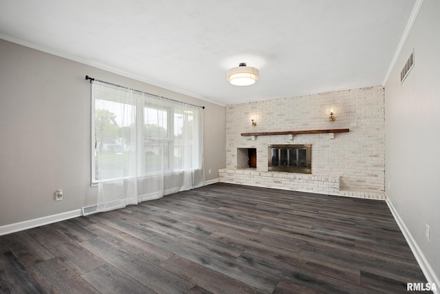 208 W Graze Ave, Dunlap, IL 61525 - unfurnished living room with crown molding, dark wood-style flooring, a fireplace, and baseboards