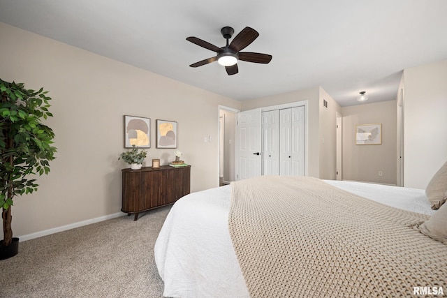3348 W Lisa Ln, Peoria, IL 61615 - carpeted bedroom with baseboards, a ceiling fan, and a closet